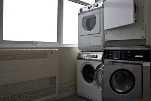 Utilities Laundry Room with Mounted Washing Machines